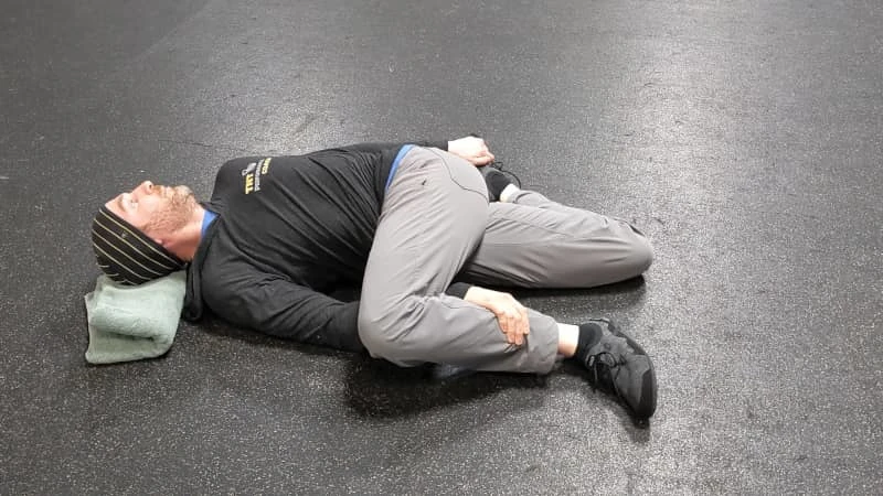 Coach Ryan demonstrates torso rotation during the Brettzel.