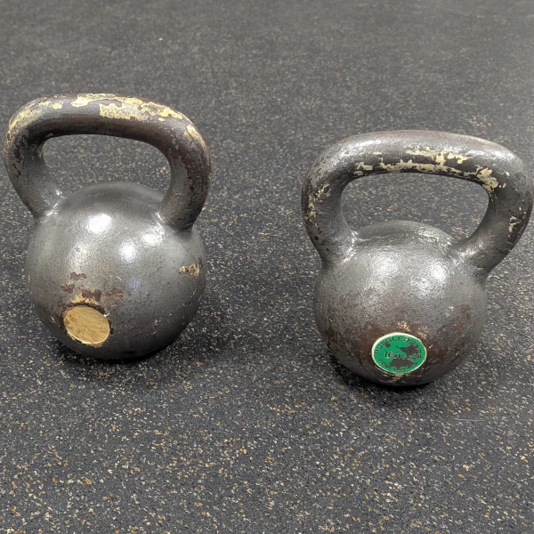Coach Ryan's first two kettlebells—16 kg and 24 kg.