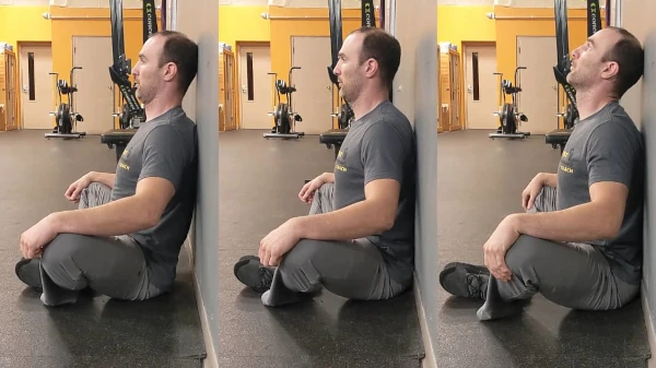 Coach Ryan demonstrates the most common FMS Wall Sit mistakes.