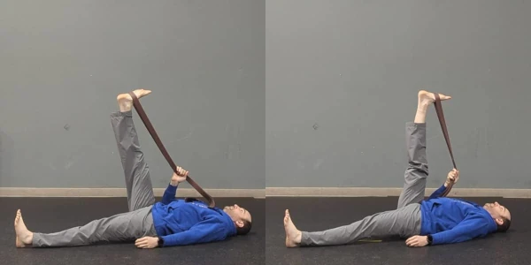 Coach Ryan demonstrates his hamstring flexibility before and after performing belt-assisted single- and adjacent-toes stretches.