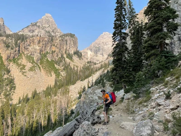 Coach Ryan standing on a trail in Garnet Canyon leading toward the basecamp of Grand Teton in Wyoming.