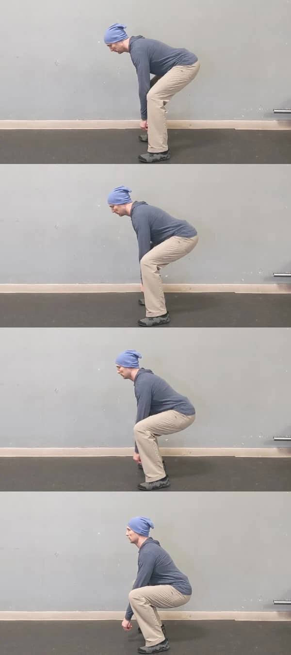 Coach Ryan demonstrates the difference between a hinge and a squat.