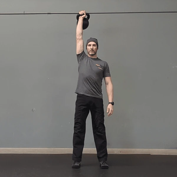 Coach Ryan demonstrates a Military Press using the lateral grip.