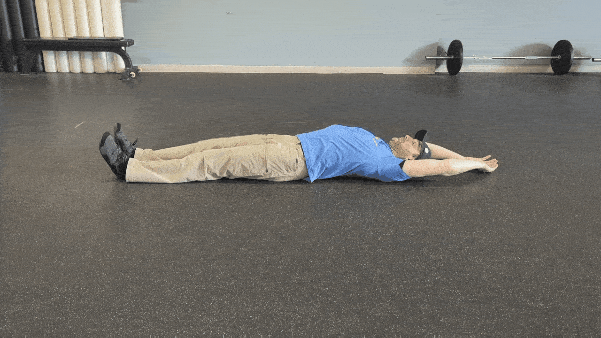 Coach Ryan demonstrates rolling by using only his lower body.