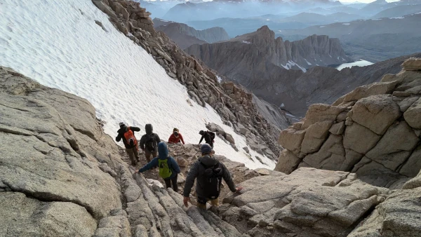 Coach Ryan and friends descend the steep Mountaineer's Route after summiting Mt. Whitney.