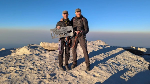 Coach Ryan and his brother, Derek, standing on the summit of Mt. Whitney—the highest point in the contiguous United States.