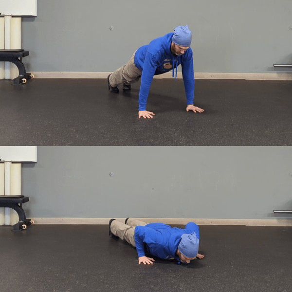 Coach Ryan demonstrates a pushup position with hands directly under his shoulders.