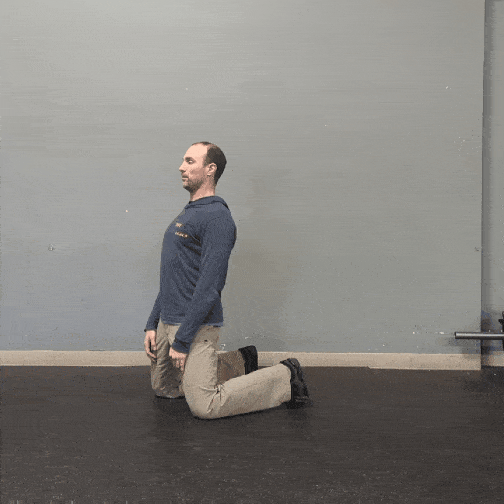Coach Ryan demonstrates a Reverse Nordic Curl.