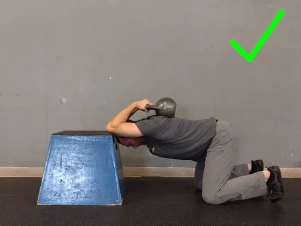 Coach Ryan demonstrates how to optimally perform the Weighted T-spine Stretch.